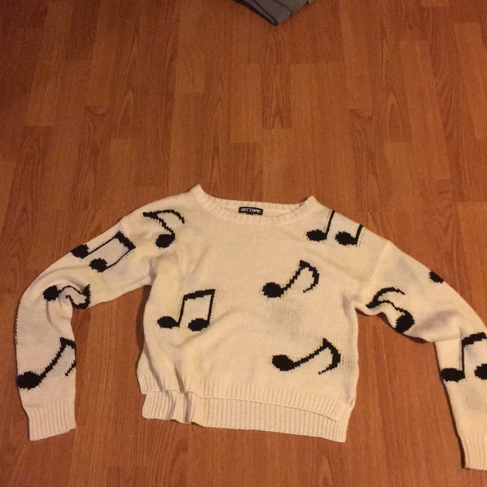 White sweater with music notes